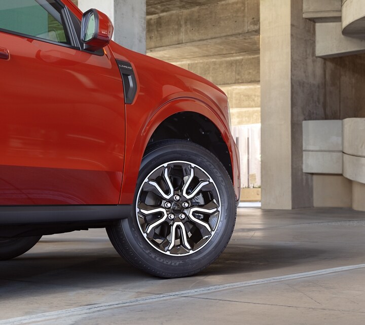 Hot Pepper Red 2023 Ford Maverick® truck in a parking garage