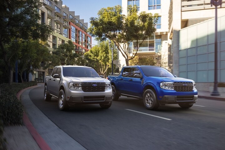 2023 Ford Maverick® XL and XLT models roaring down a three-lane city street