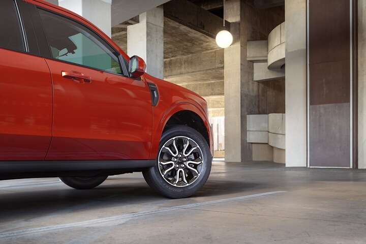 Hot Pepper Red 2023 Ford Maverick® truck in a parking garage