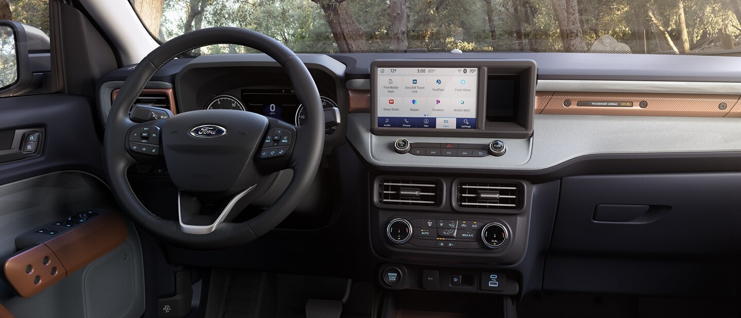 A close-up of the dash and steering wheel of a 2024 Ford Maverick® truck