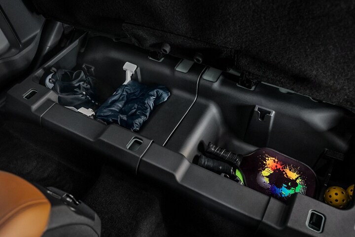 A close-up of interior storage compartments in a 2024 Ford Maverick® truck