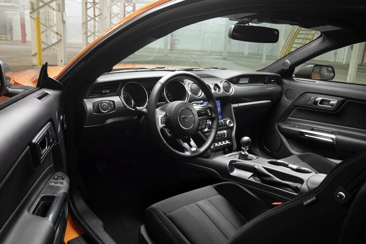 Interior view of a 2021 Ford Mustang with the door open