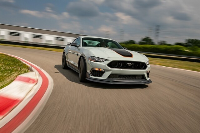 A 2021 Ford Mustang mach one being driven on a track