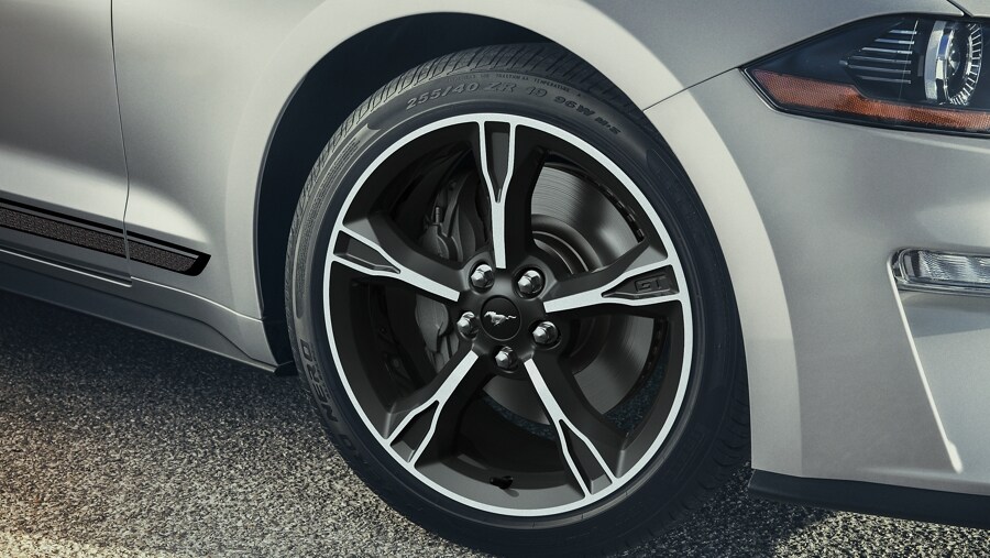 Close-up of 19-inch x 8.5-inch machined-face aluminum Carbonized Gray-painted wheels