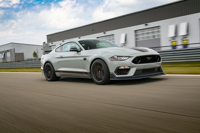 A 2023 Ford Mustang® Mach 1® coupe being driven on a track
