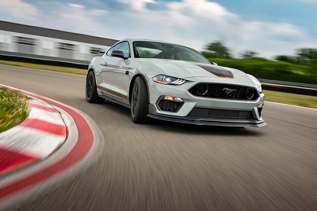 A 2023 Ford Mustang® Mach 1® coupe being driven on a closed course