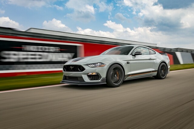 A 2023 Ford Mustang® Mach 1® coupe being driven on a racetrack