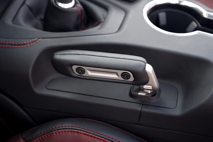 2024 Ford Mustang® electronic parking brake, shifter and interior with available Carmine Red seating material and stitching