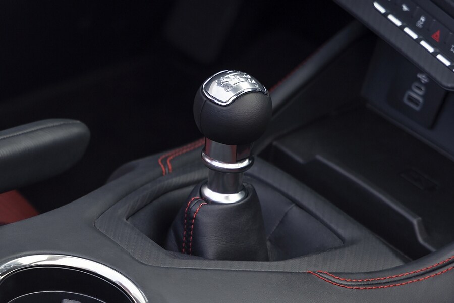 2024 Ford Mustang® shifter and interior with available Carmine Red accent stitching