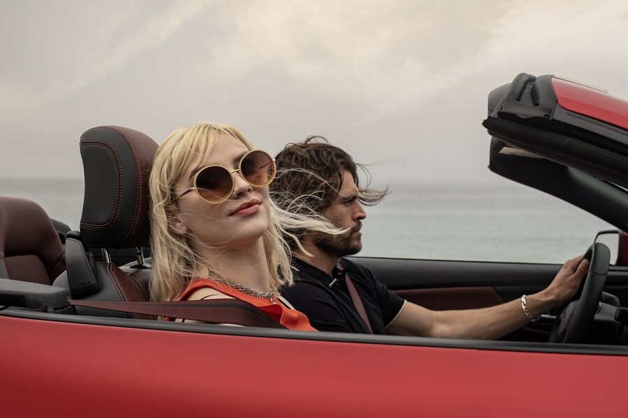 Two people in a 2024 Ford Mustang® convertible