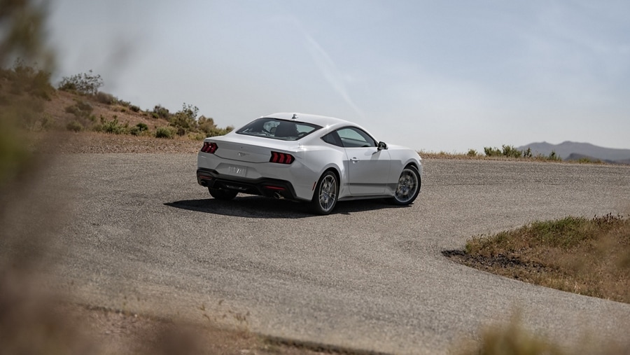 2024 Ford Mustang® EcoBoost® coupe being driven on a desert road