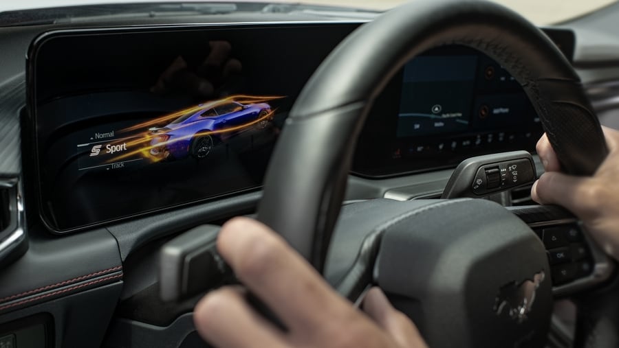 Person driving a 2024 Ford Mustang® coupe