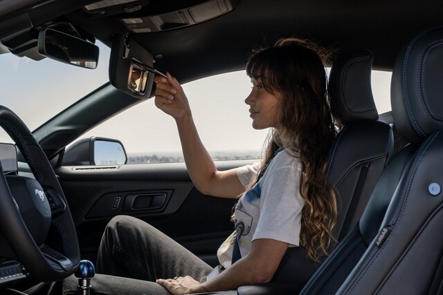 Person sitting in a 2024 Ford Mustang® Dark Horse™ coupe