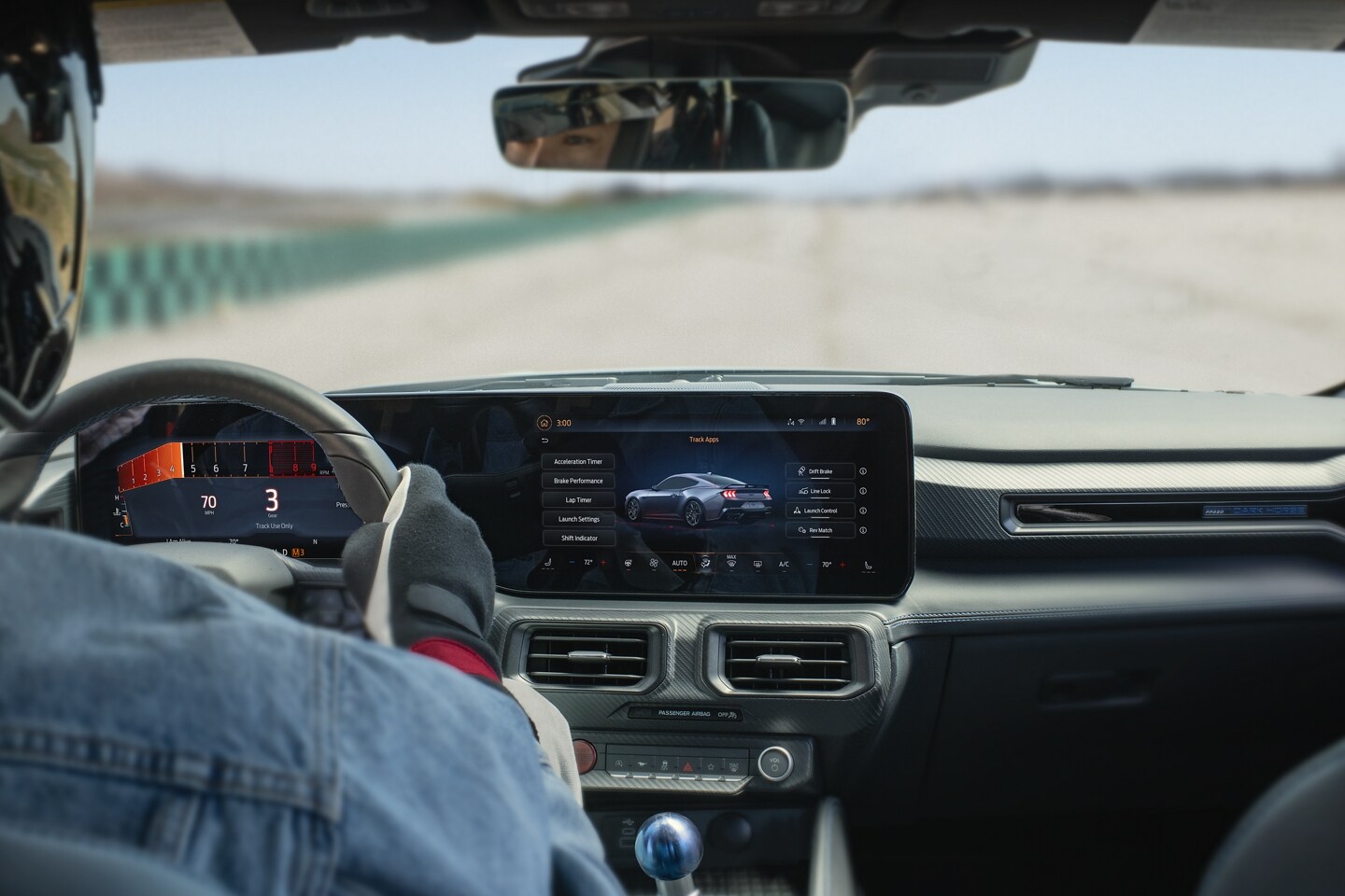 2025 Ford Mustang being driven by professional auto cross track driver