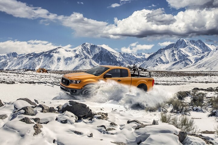 2021 Ford Ranger on snow covered mountain terrain with optional bed mounted rack accessory