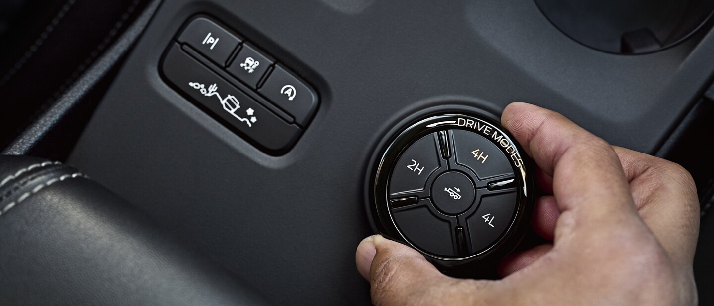 Close-up of a hand engaged with a dial for Shift-On-The-Fly on 2024 Ford Ranger® truck