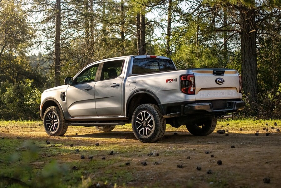 A 2024 Ford Ranger® truck in Oxford White is parked in a scenic location