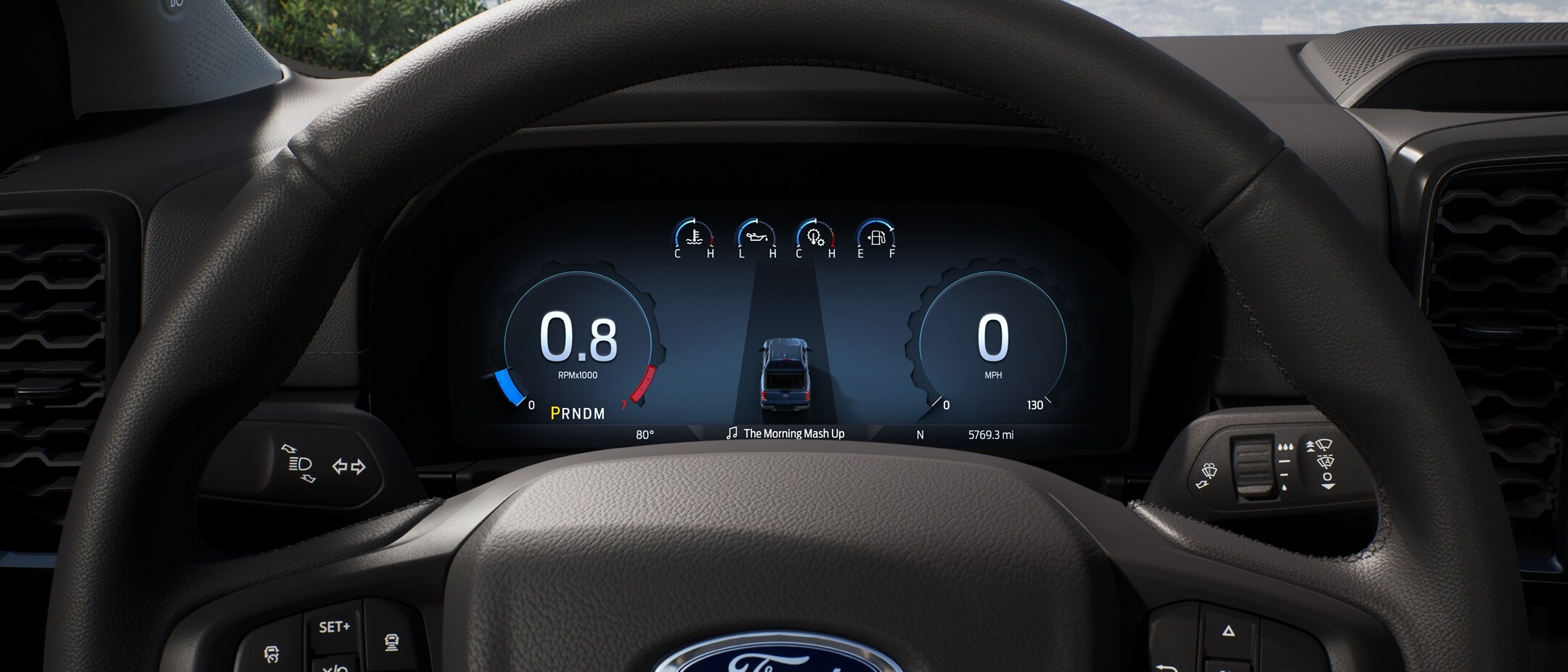 Close-up of the Digital Instrument Cluster displaying MyMode and steering wheel. Raptor shown. 