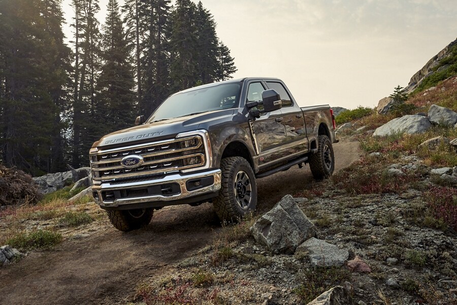 2023 Ford Super Duty® Tremor® model descending a rocky path