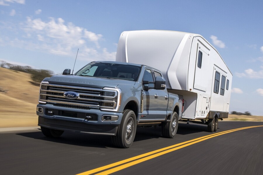 2023 Ford Super Duty® truck pulling a camper trailer