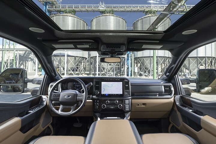 Interior of the 2024 Ford Super Duty® F-350® LARIAT model highlighting the dash and twin-panel moonroof