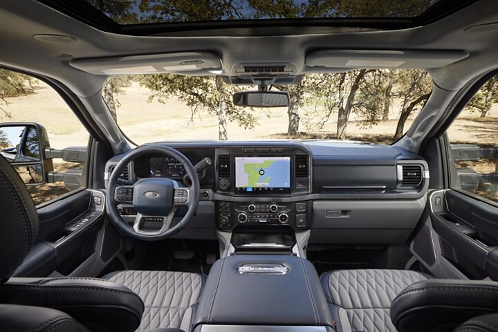 Interior of a 2024 Ford Super Duty® F-350® Limited model with Admiral Blue Light Slate two-tone leather seats