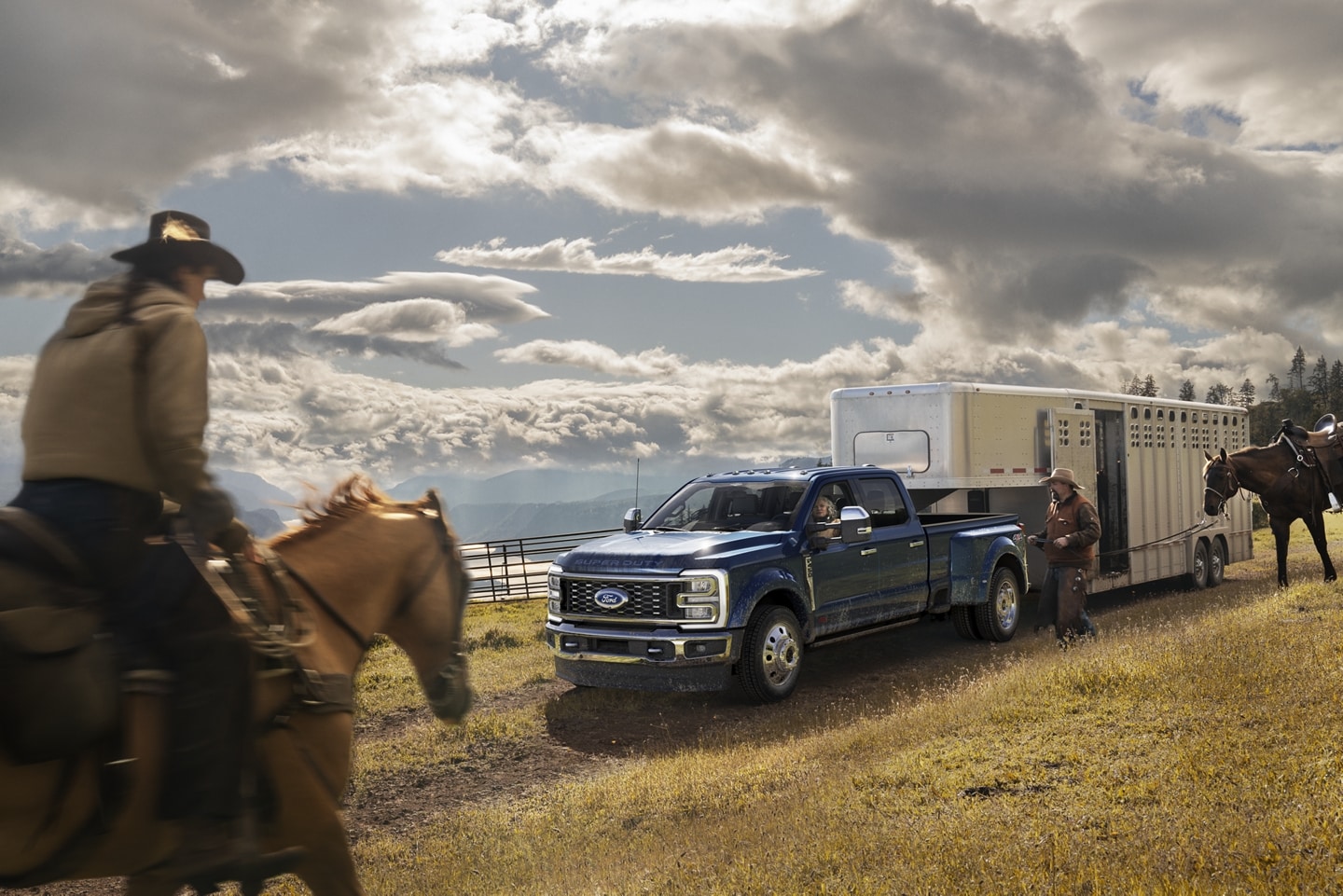 2024 Ford Super Duty towing horse trailer.