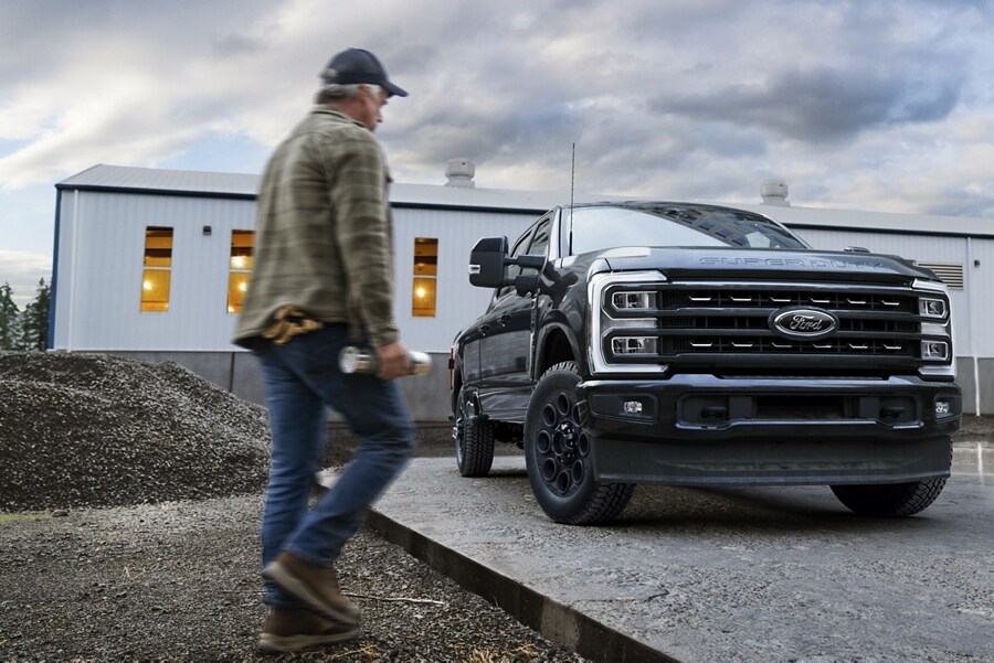 Man walking near a 2024 Ford Super Duty® pickup