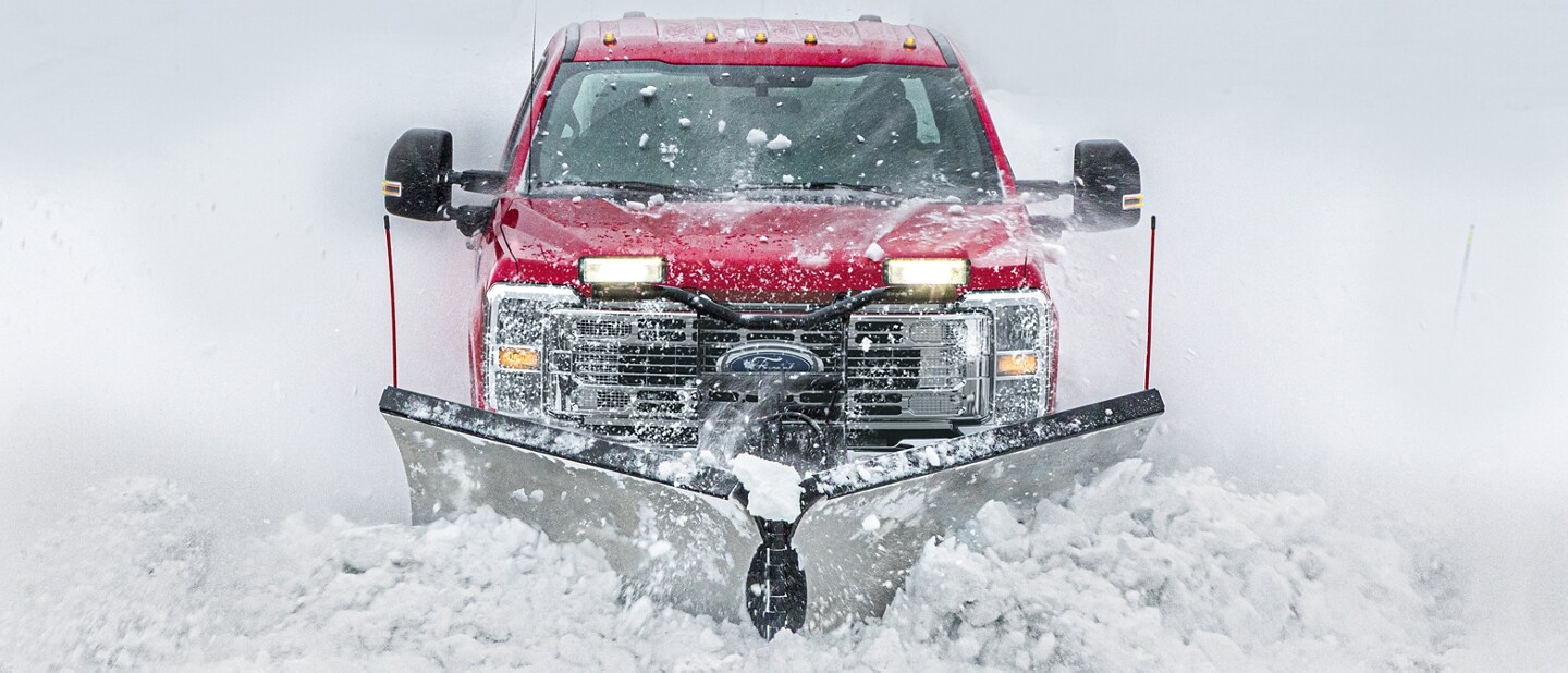 A 2023 Ford Super Duty® truck upfitted with snowplowing capabilities