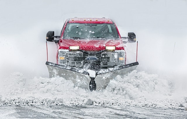 A 2024 Ford Super Duty® truck upfitted with snowplowing capabilities