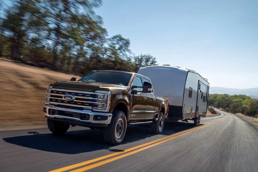 2025 Ford Super Duty® F-250® LARIAT® model pulling a camper
