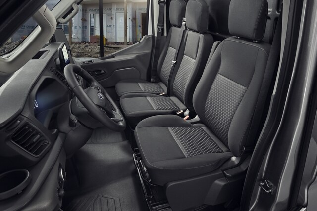 Interior view of 2023 Ford Transit® Crew Vab showing 3-across seating.