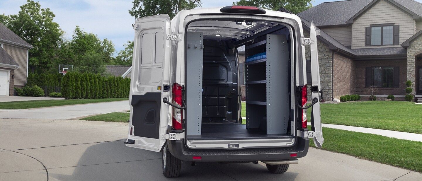 Rear view of a 2023 Ford Transit® van with an open cargo doors