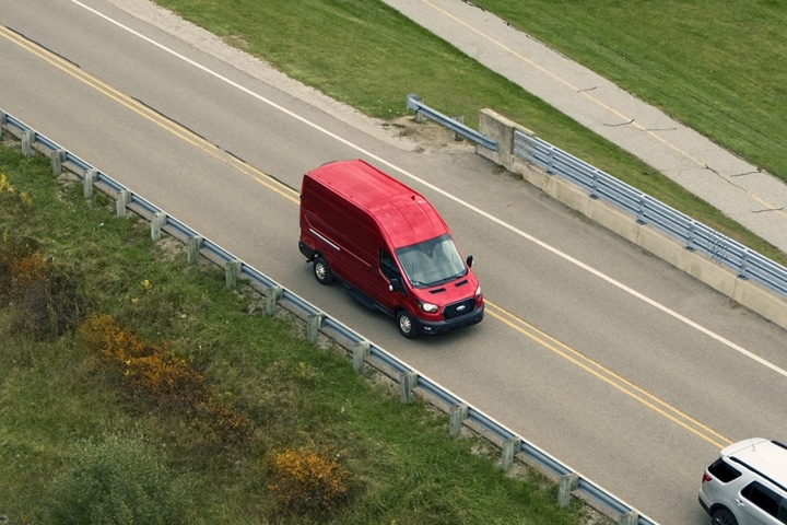 Overhead view of a 2023 Ford Transit® Van driving on a highway