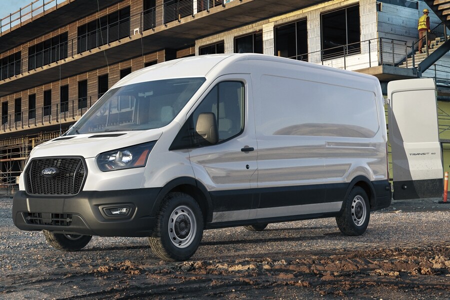 A 2023 Ford Transit® van at a large scale construction site