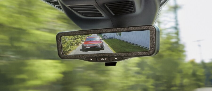 Image of vehicle on road in virtual rear view mirror in 2023 Ford Transit®