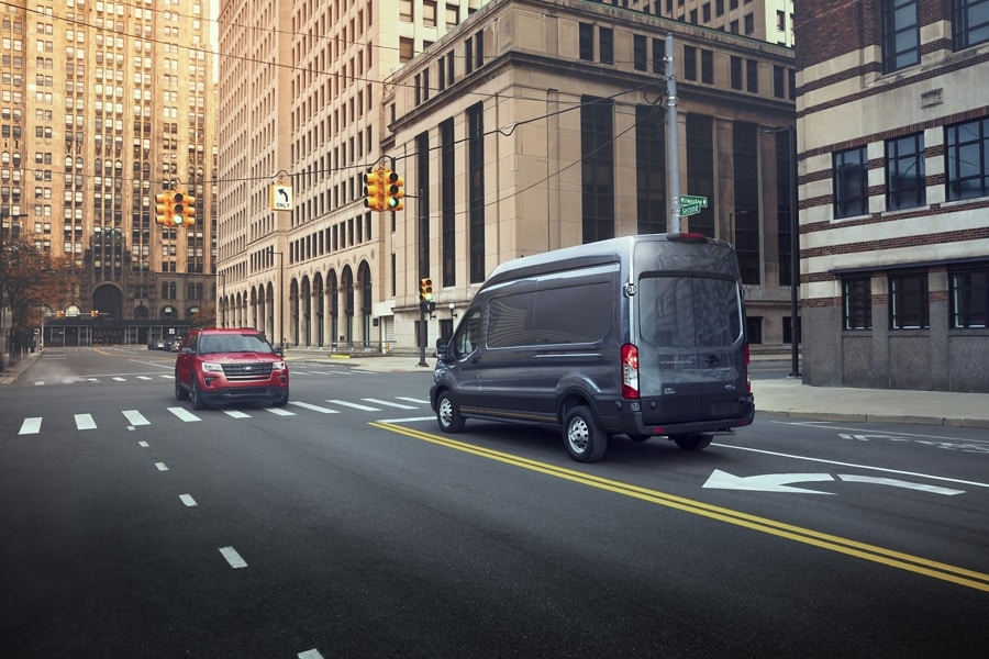 A 2024 Ford Transit® van in an urban environment