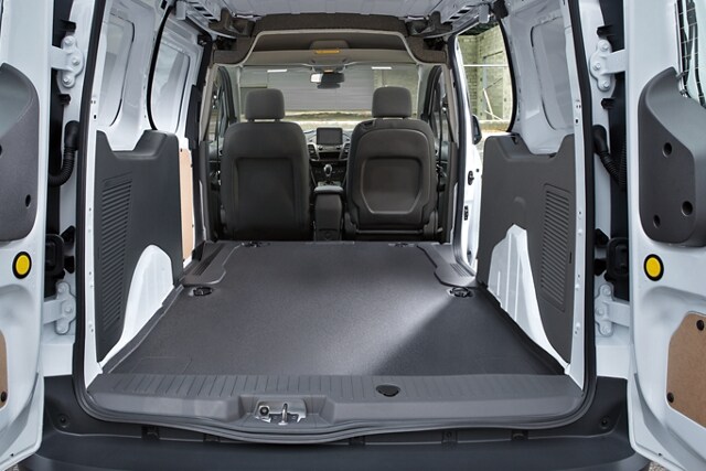 Interior of 2023 Ford Transit Connect Cargo Van showing ample wheel well width