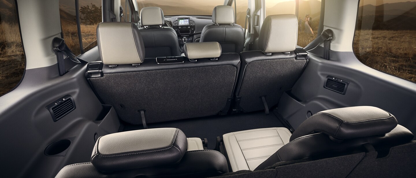 Spacious interior of 2023 Ford Transit Connect Passenger Wagon showing an available seating configuration