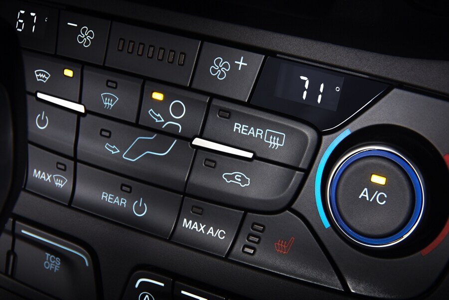 Panel controls for the available Quickclear™ electric windshield defroster