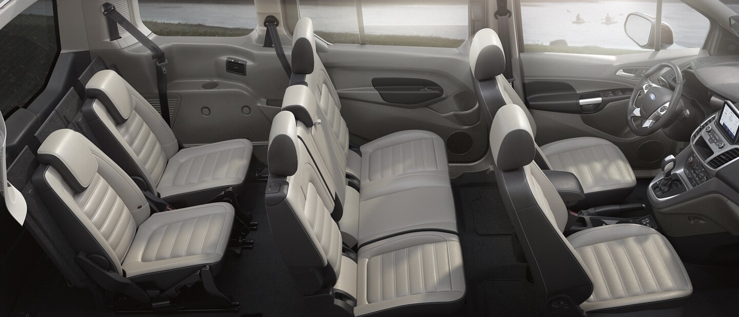 Spacious interior of 2023 Ford Transit Connect Passenger Wagon showing an available seating configuration