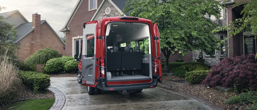 The rear of a 2023 Ford Transit® van with the doors open