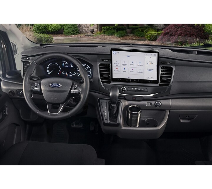 Close up of the 2023 Ford Transit® van steering wheel and dashboard.